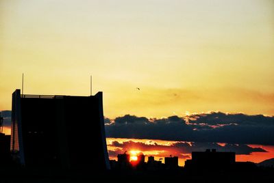 Silhouette of buildings at sunset