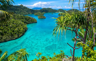 Scenic view of sea against blue sky