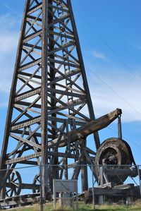 Low angle view of old bridge against sky