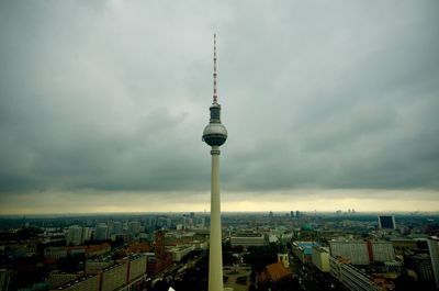 Fernsehturm against cloudy sky