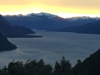 Scenic view of mountains against sky during sunset