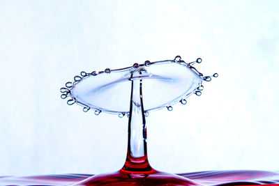 Close-up of electric lamp against white background