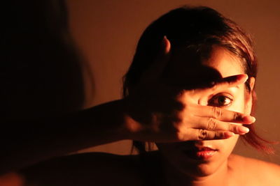 Close-up portrait of young woman