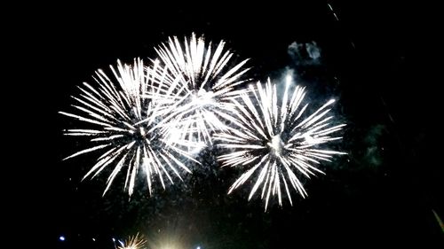 Firework display at night