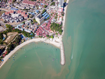 High angle view of beach by buildings in city