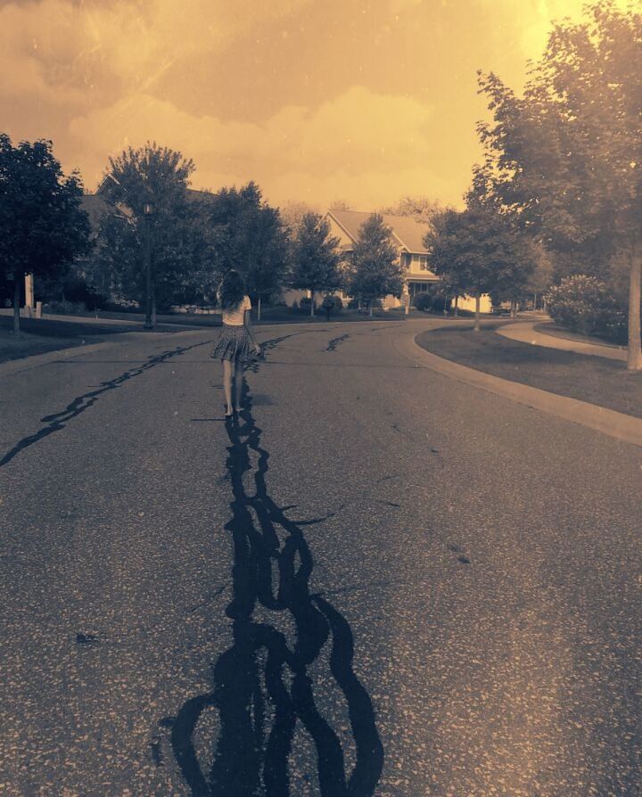 tree, sky, bicycle, transportation, road, street, sunset, cloud - sky, the way forward, silhouette, land vehicle, outdoors, incidental people, shadow, nature, sunlight, cloud, lifestyles