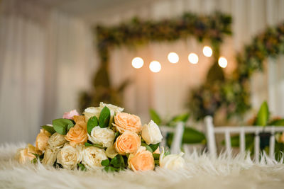 Close-up of roses on table