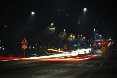 Light trails on city street at night