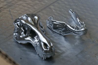 High angle view of ring on wet metal