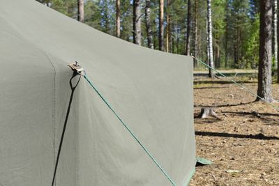 Close-up of rope tied to tent