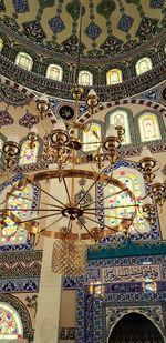 Low angle view of ornate ceiling