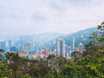 Buildings in city against sky