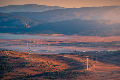 Scenic view of mountains against sky during sunset