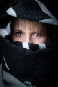 Portrait of woman with snow covered face