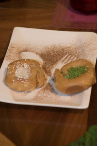 High angle view of ice cream in plate on table