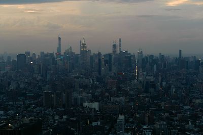 Cityscape against sky during sunset