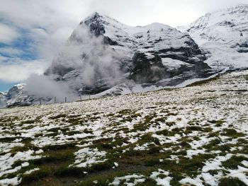 Snowcapped mountains against sky