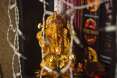 Statue in temple outside building