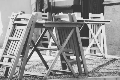 Close-up of empty chairs and table