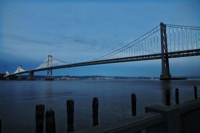 View of suspension bridge over sea