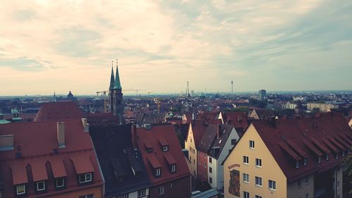 High angle view of townscape against sky in city