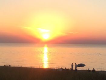 Scenic view of sunset over sea