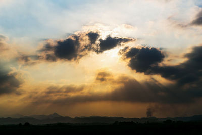 Scenic view of silhouette landscape against sky during sunset