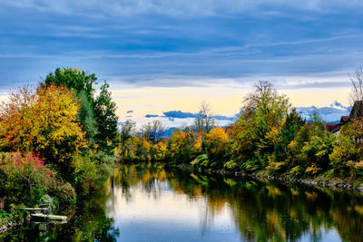 Scenic view of lake against sky during autumn