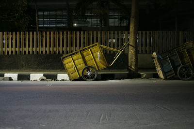 Vehicles on road against buildings