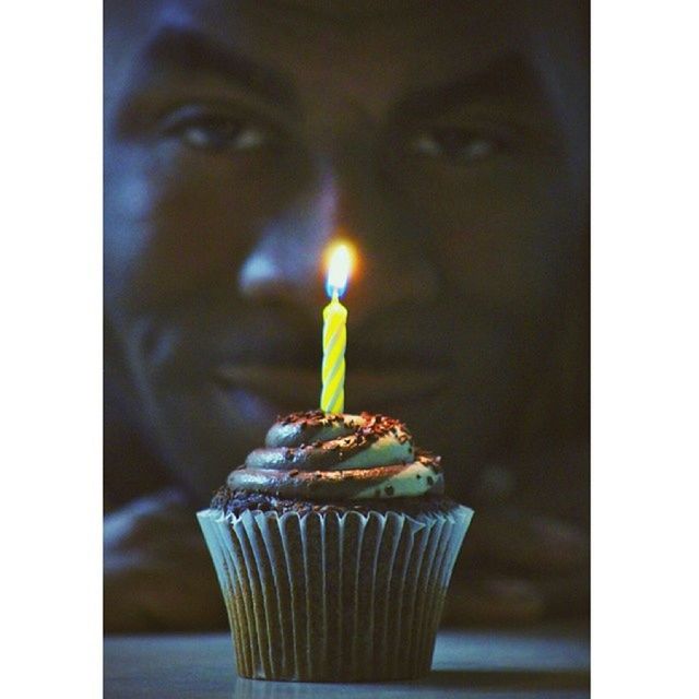 transfer print, indoors, auto post production filter, focus on foreground, flame, close-up, candle, food and drink, burning, selective focus, illuminated, table, human representation, holding, fire - natural phenomenon, still life, religion, spirituality