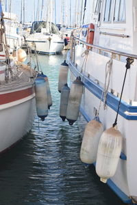 Boats moored at harbor
