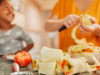 High angle view of woman preparing food in kitchen