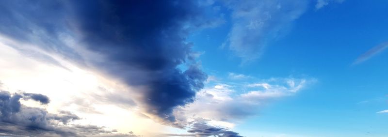 Low angle view of clouds in blue sky