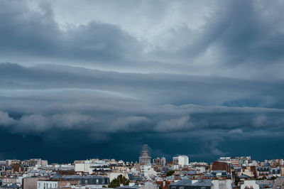 Supercell storm cloud over paris roofs in 2021