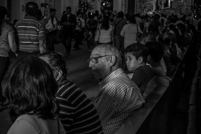 Group of people looking at store