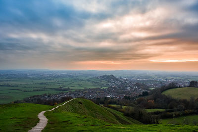 Scenic view of landscape against sky during sunset