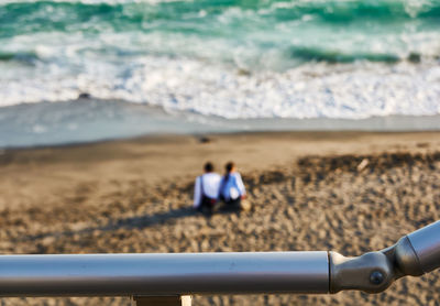 Two people on beach