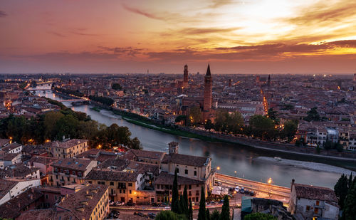 High angle view of city buildings during sunset