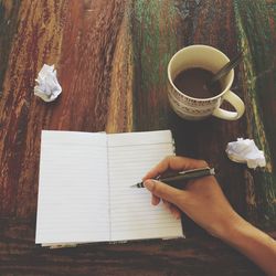 Coffee cup on wooden table