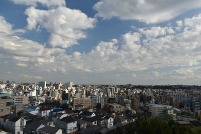 High angle view of buildings against sky in city