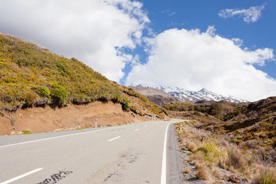 Surface level of empty road along landscape