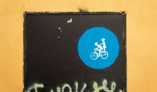 Close-up of text on wall