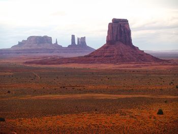 Scenic view of rock formations against sky