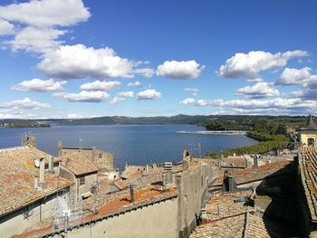 High angle view of town against cloudy sky