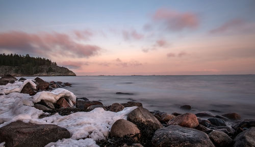 Scenic view of sea against sky during sunset