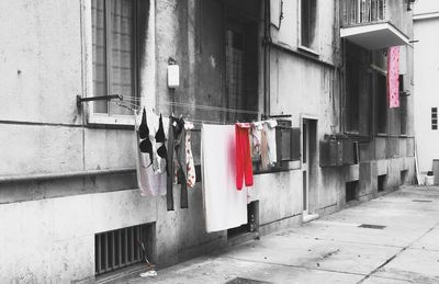 Clothes drying outside house