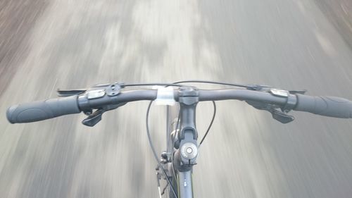 Person riding bicycle on road