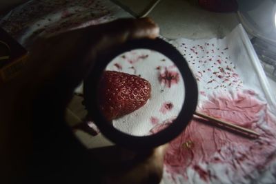 Close-up of hand on table