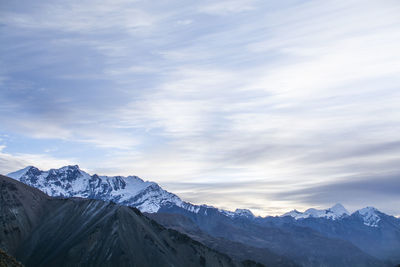 Scenic view of snowcapped mountains against sky