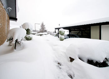 White car on snow covered landscape